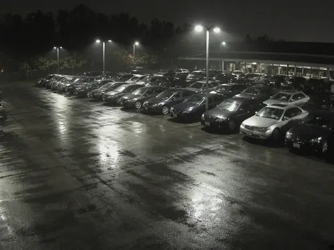 Auto dealership security camera monitoring of a vehicle inventory lot for live video monitoring