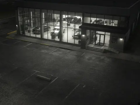 Auto dealership security monitoring of a showroom and lot for remote video monitoring and live security camera monitoring