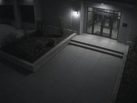 Commercial property security monitoring of a business campus entrance for remote video monitoring and live security camera monitoring