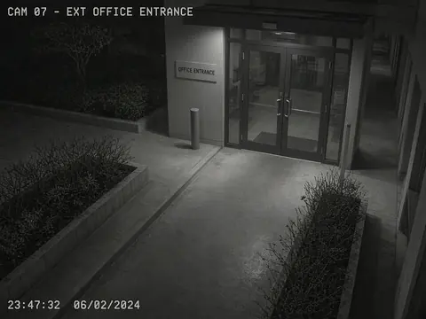 Office security camera monitoring of a quiet lobby entrance for remote video monitoring and live security camera monitoring