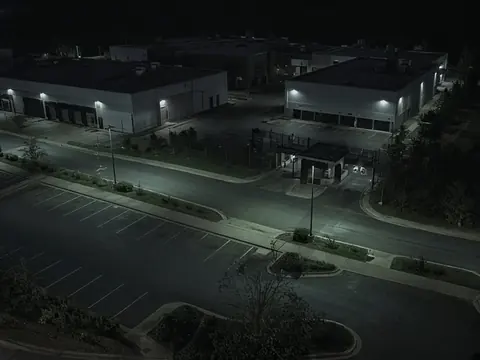 Live security camera monitoring of a quiet business site perimeter for remote video monitoring