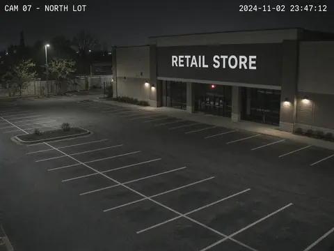 Live security camera monitoring of a retail parking area after hours for remote video monitoring
