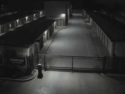Storage facility security monitoring of entry gates and unit aisles for remote video monitoring and live security camera monitoring